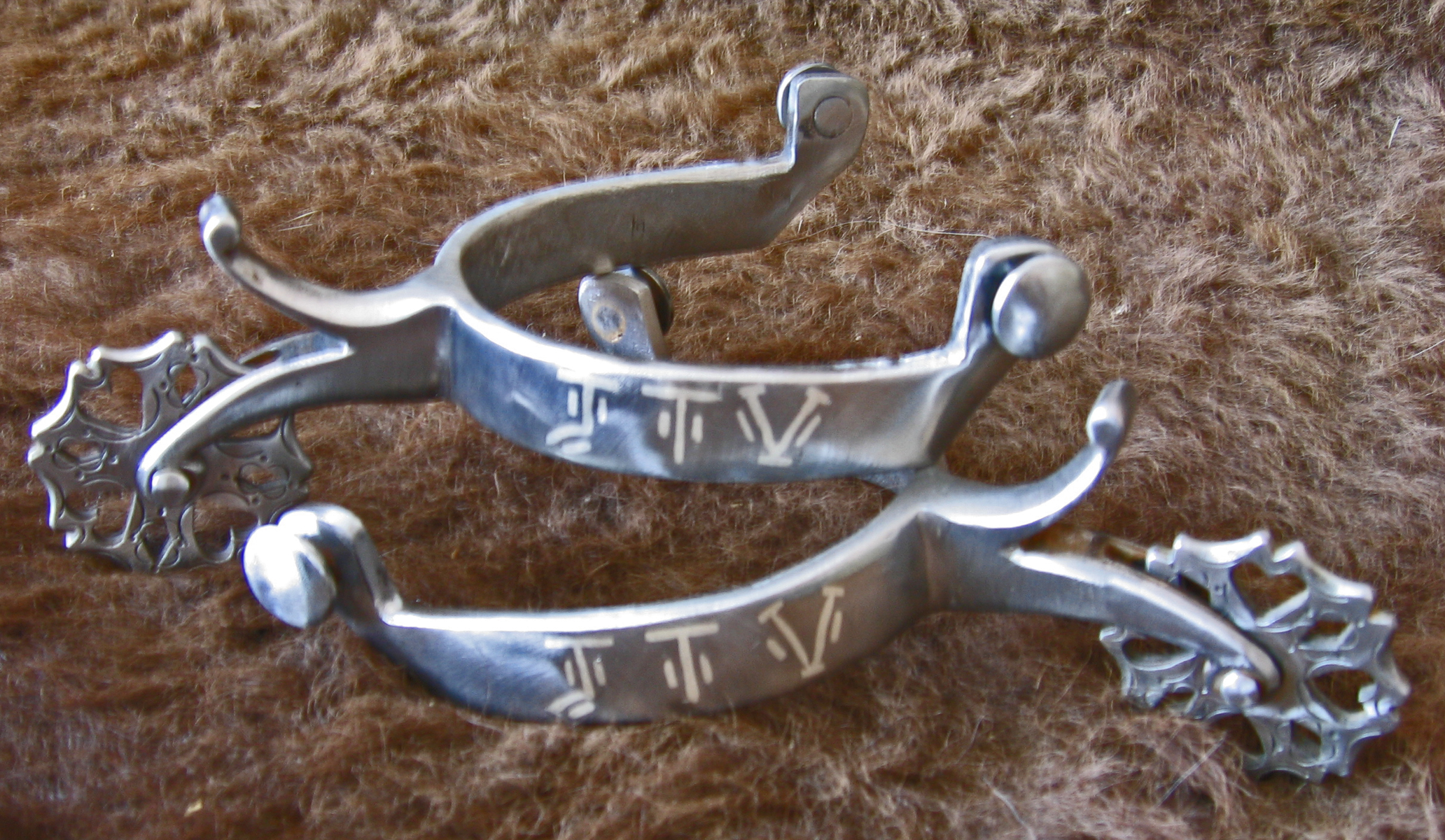 0692 JTV Branded inlay spurs copy